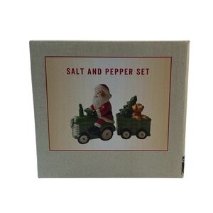 Cracker Barrel Santa On A Tractor Pulling A Dog Salt and Pepper Shaker Set New